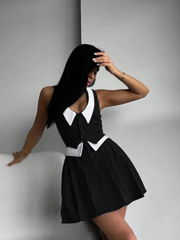 Women's Fashion and Elegant Black and White Deep Plunge Neck Top and Pleated Skirt Two Piece Set - Image 4
