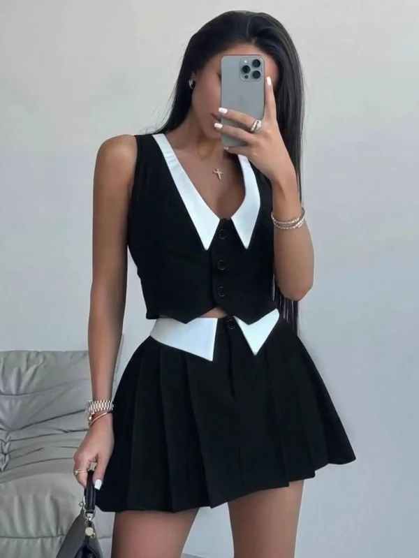 Women's Fashion and Elegant Black and White Deep Plunge Neck Top and Pleated Skirt Two Piece Set - Image 3