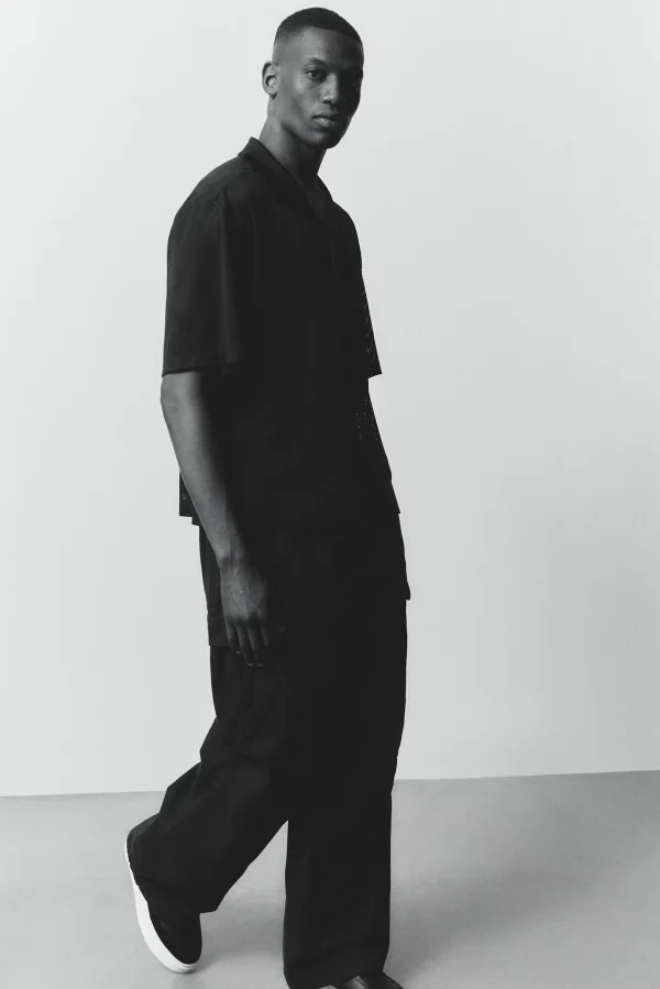 Man's Black Drawstring Loose Fit Cargo Trousers - Image 3